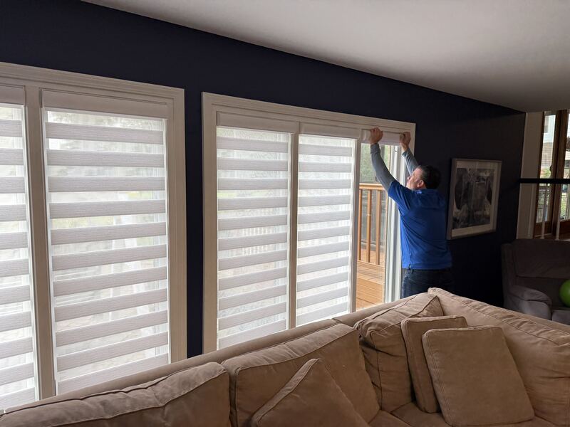 Designer Banded Shades across a wide patio-door wall.
