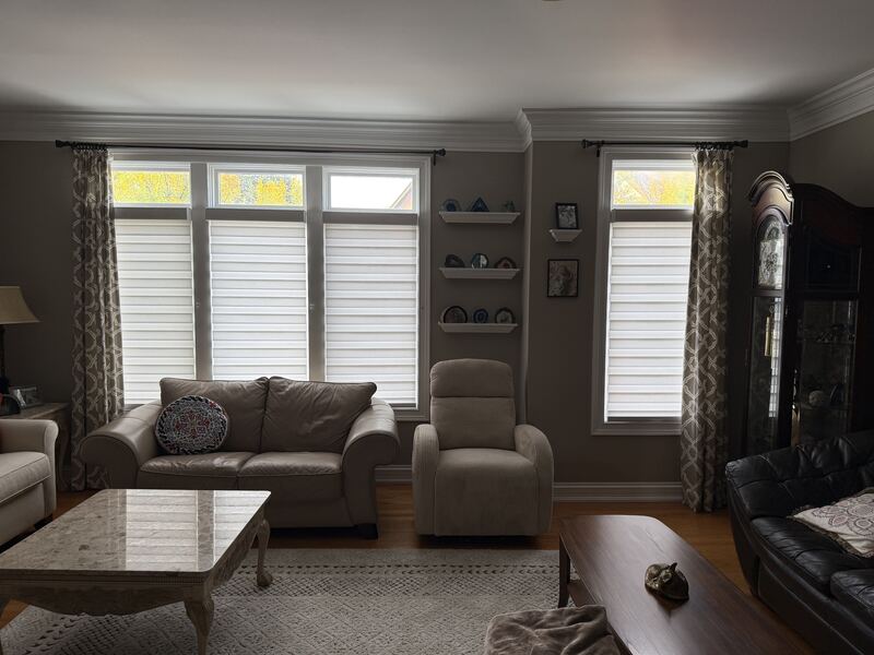 The same living room after sheer shadings were installed