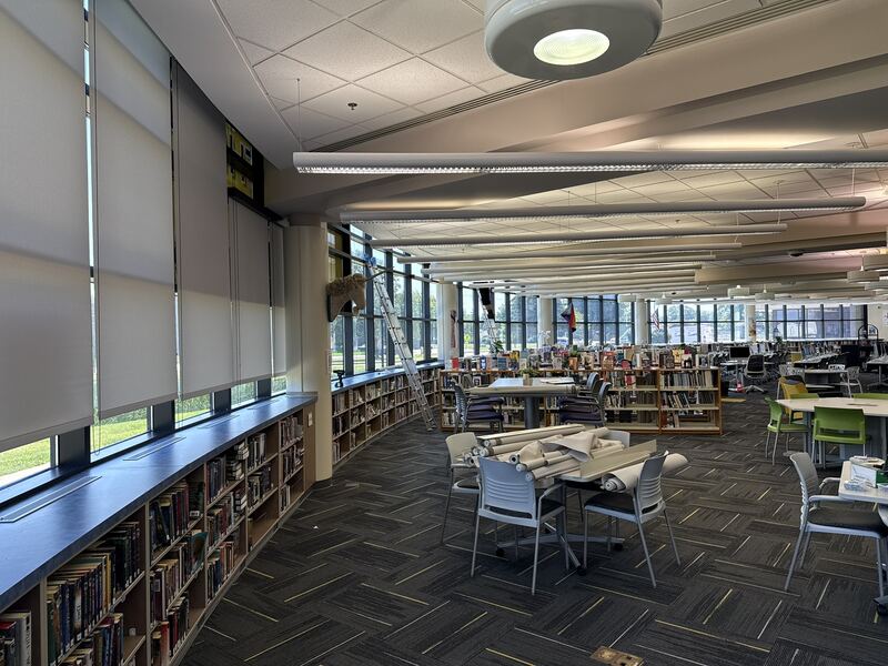 Installing screen shades at Glenbard North High School